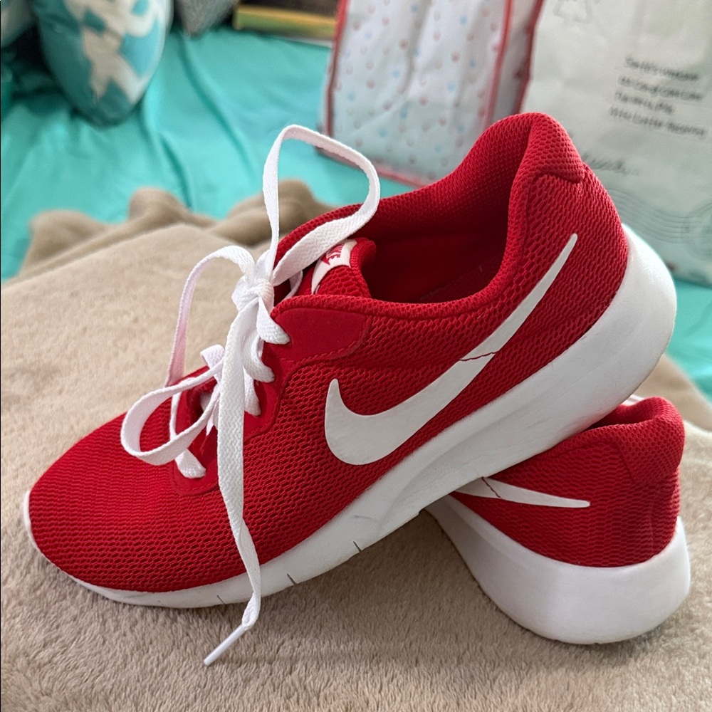 NIKE Red Mesh Sneakers with White Swoosh. Excellent condition. Big Kids 5.5